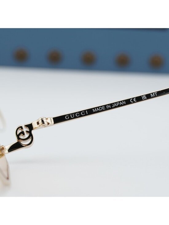 Gucci GG1604S 004 Sunglasses Gold Geometric Frame